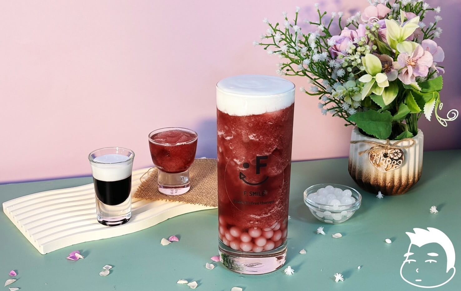 Purple Cloud bubble tea with grape syrup, jasmine green tea, yogurt popping boba, and cheese milk foam